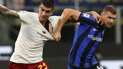 Gianluca Mancini of Roma and Edin Dzeko of Inter