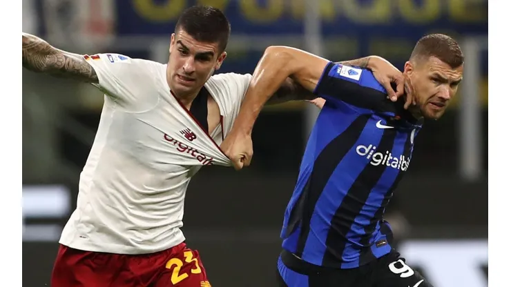 Gianluca Mancini of Roma and Edin Dzeko of Inter
