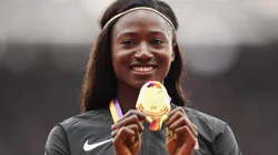Tori Bowie poses with the gold medal for the Women's 100 meters at IAAF World Athletics Championships London 2017