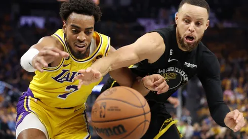 Troy Brown Jr. of the Los Angeles Lakers and Stephen Curry of the Golden State Warriors