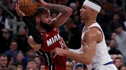Caleb Martin #16 of the Miami Heat tries to pass as Josh Hart #3 of the New York Knicks