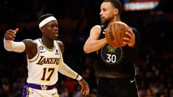 Stephen Curry #30 of the Golden State Warriors controls the ball against Dennis Schroder #17 of the Los Angeles Lakers