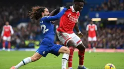 Bukayo Saka of Arsenal holds off Marc Cucurella of Chelsea