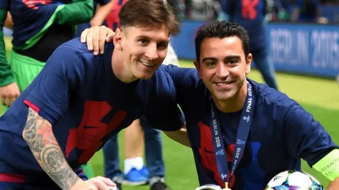 Lionel Messi and Xavi Hernandez