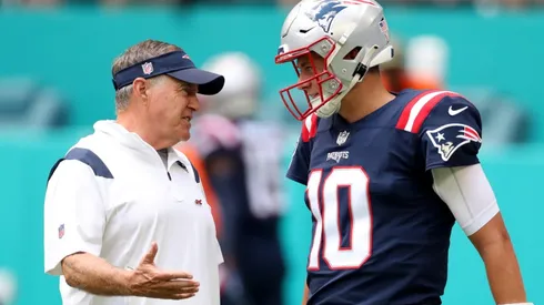 Bill Belichick (left) talking with Mac Jones – New England Patriots – NFL 2022