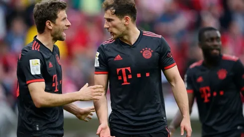 Thomas Mueller of Bayern Munich discusses with Leon Goretzka