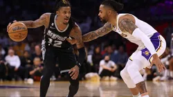 Ja Morant #12 of the Memphis Grizzlies dribbles in front of D'Angelo Russell #1 of the Los Angeles Lakers