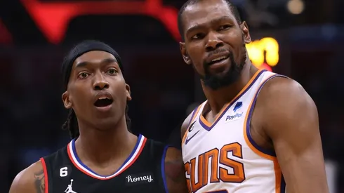 Terance Mann #14 of the LA Clippers and Kevin Durant #35 of the Phoenix Suns