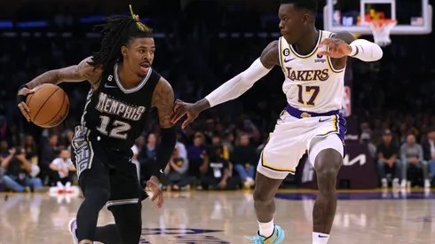 Ja Morant #12 of the Memphis Grizzlies drives to the basket on Dennis Schroder #17 of the Los Angeles Lakers