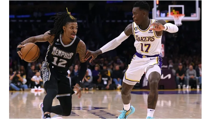Ja Morant #12 of the Memphis Grizzlies drives to the basket on Dennis Schroder #17 of the Los Angeles Lakers