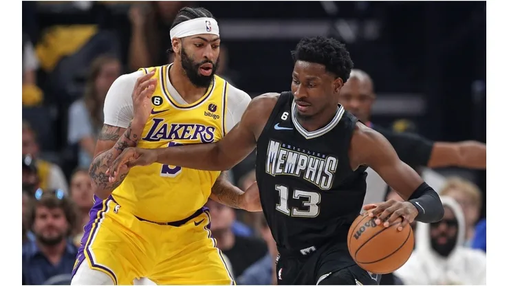 Jaren Jackson Jr. #13 of the Memphis Grizzlies handles the ball against Anthony Davis #3 of the Los Angeles Lakers