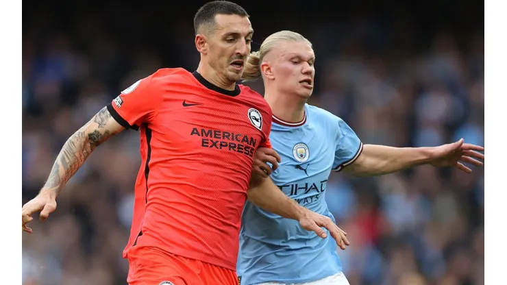 Lewis Dunk of Brighton and Erling Haaland of Manchester City