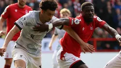 Curtis Jones of Liverpool and Serge Aurier of Nottingham Forest