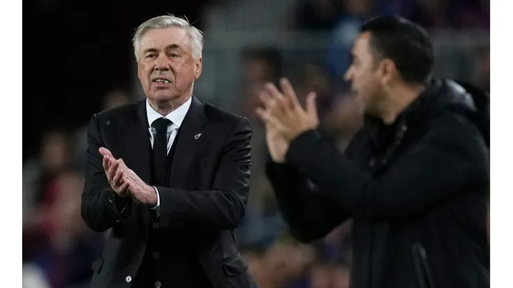 Carlo Ancelotti and Xavi Hernandez.