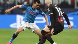 Hirving Lozano of SSC Napoli battles for possession with Theo Hernandez of AC Milan