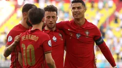 Cristiano Ronaldo of Portugal celebrates with Diogo Jota and Bernardo Silva.