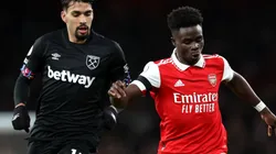 Lucas Paqueta of West Ham and Bukayo Saka of Arsenal