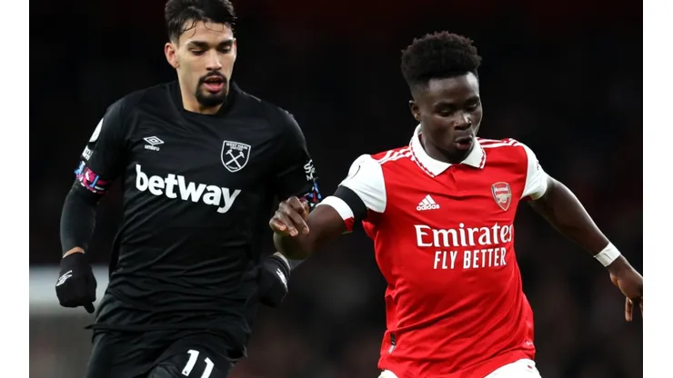 Lucas Paqueta of West Ham and Bukayo Saka of Arsenal