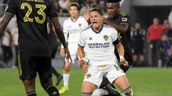 Javier Hernandez #14 of Los Angeles Galaxy is fouled by Jose Cifuentes #20 of Los Angeles FC