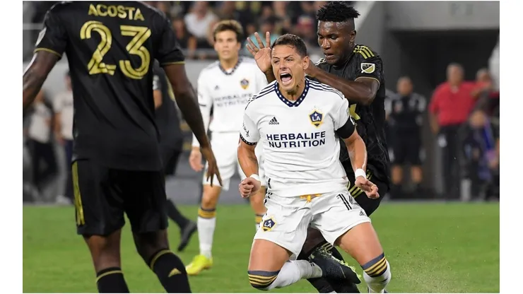 Javier Hernandez #14 of Los Angeles Galaxy is fouled by Jose Cifuentes #20 of Los Angeles FC
