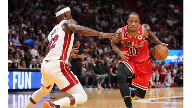 DeMar DeRozan #11 of the Chicago Bulls drives against Jimmy Butler #22 of the Miami Heat.