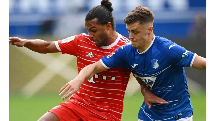 Serge Gnabry of Bayern and Christoph Baumgartner of Hoffenheim