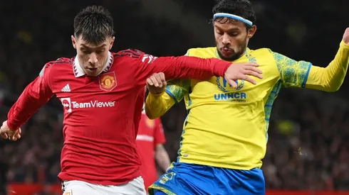 Lisandro Martinez of Manchester United and Gustavo Scarpa of Nottingham Forest