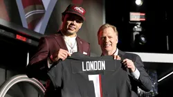 Drake London (left/Atlanta Falcons) with Commissioner Roger Goodell - 2022 NFL Draft