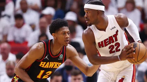 Jimmy Butler is defended by De'Andre Hunter.