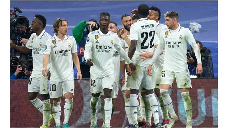 Karim Benzema of Real Madrid celebrates with teammates