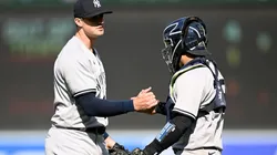 Clay Holmes #35 of the New York Yankees celebrates with Jose Trevino