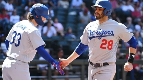JD Martinez #28 of the Los Angeles Dodgers celebrates with James Outman