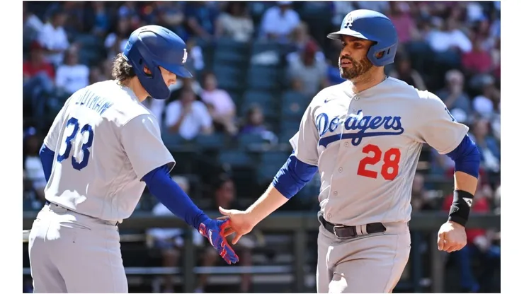 JD Martinez #28 of the Los Angeles Dodgers celebrates with James Outman