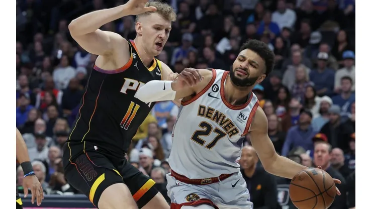 Jamal Murray of the Denver Nuggets and Jock Landale of the Phoenix Suns