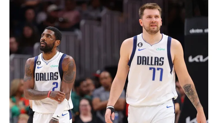 Kyrie Irving #2 and Luka Doncic #77 of the Dallas Mavericks react against the Atlanta Hawks