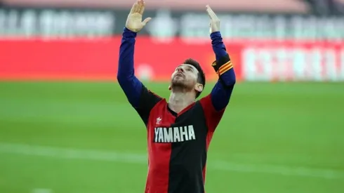 Lionel Messi wearing a vintage Newell's jersey