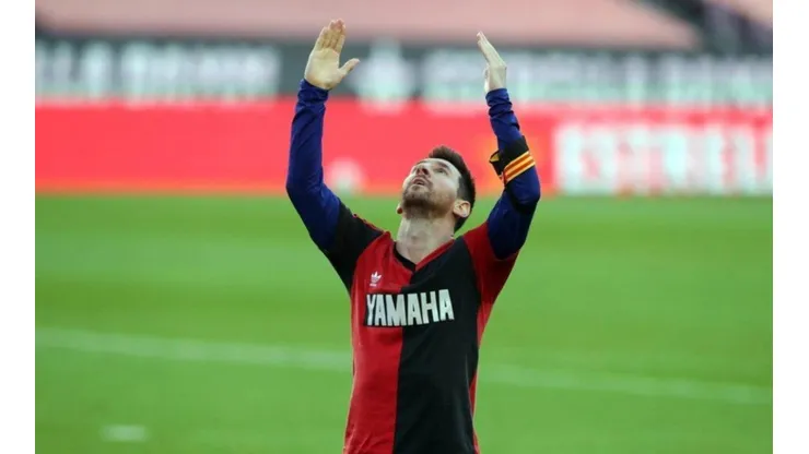 Lionel Messi wearing a vintage Newell's jersey