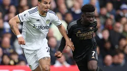Pascal Struijk of Leeds and Bukayo Saka of Arsenal