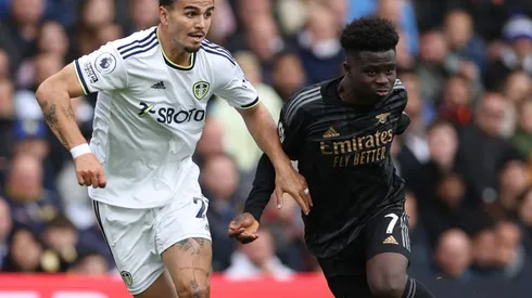Pascal Struijk of Leeds and Bukayo Saka of Arsenal
