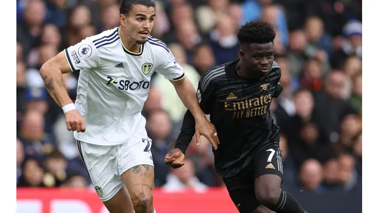 Pascal Struijk of Leeds and Bukayo Saka of Arsenal
