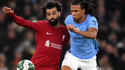 Mohamed Salah of Liverpool and Nathan Ake of Manchester City