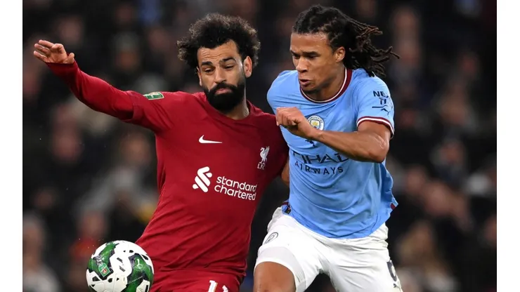 Mohamed Salah of Liverpool and Nathan Ake of Manchester City