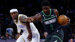 Jarred Vanderbilt of the Los Angeles Lakers and Anthony Edwards of the Minnesota Timberwolves