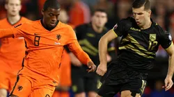 Georginio Wijnaldum of Netherlands and Jayce Olivero of Gibraltar