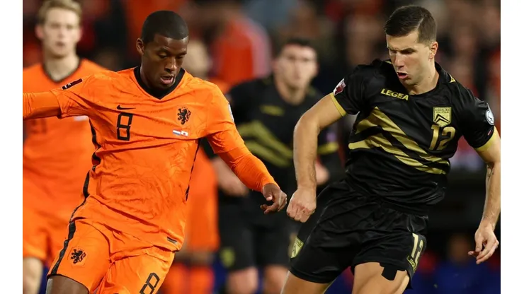 Georginio Wijnaldum of Netherlands and Jayce Olivero of Gibraltar
