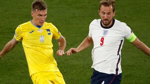 Heorhii Sudakov of Ukraine and Harry Kane of England