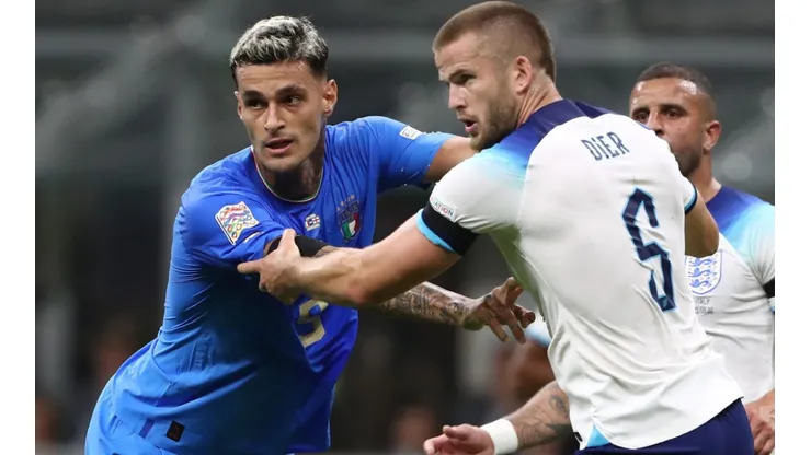 Gianluca Scamacca of Italy and Eric Dier of England