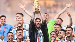 Lionel Messi lifts the FIFA World Cup trophy at Qatar 2022.