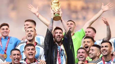 Lionel Messi lifts the FIFA World Cup trophy at Qatar 2022.