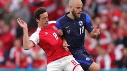 Thomas Delaney of Denmark and Teemu Pukki of Finland